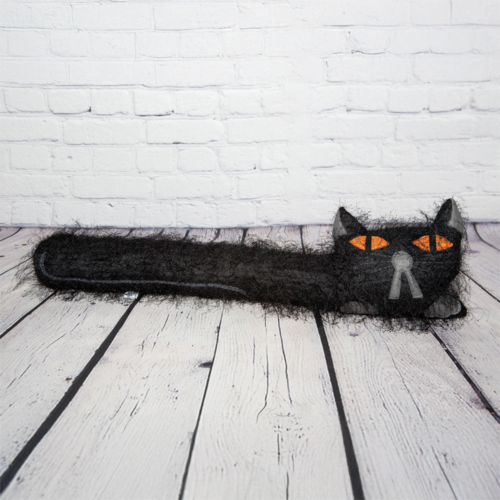 Long Haired Black Flat Cat Draft Excluder Amber Eyes