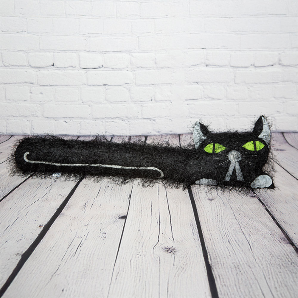 Long Haired Black Flat Cat Draft Excluder Green Eyes